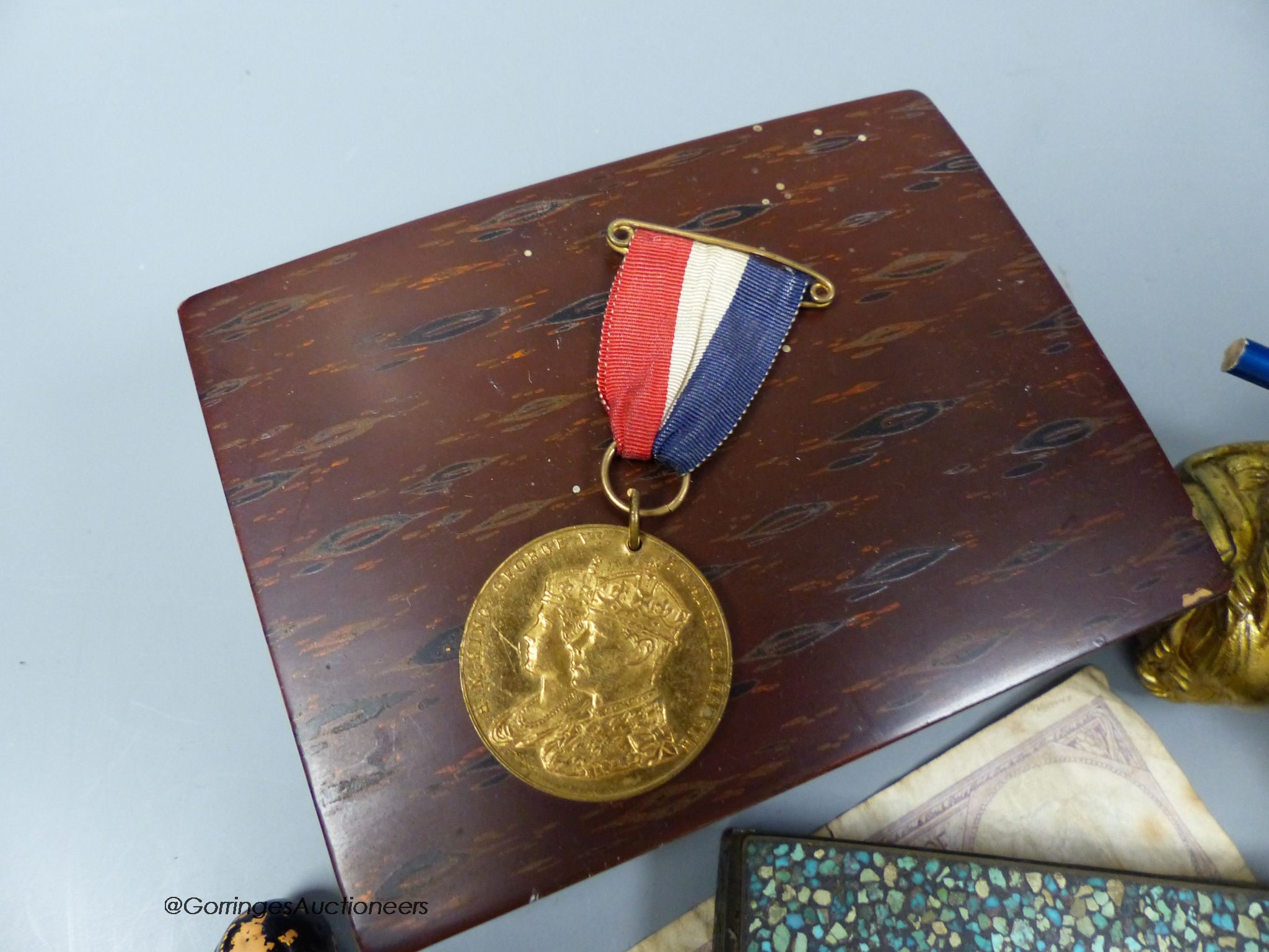 A 19th century gilt bronze figure surmount, brass 'Legs' nutcrackers and other items